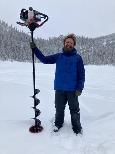 Dr. Ted Ozesky sampling a frozen lake. Photo by Christian Therrien.