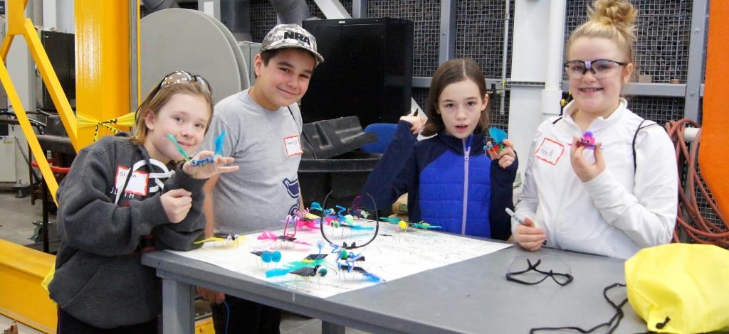 Students at SWE Event with Solar Bugs